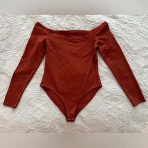 Off the shoulder body suit